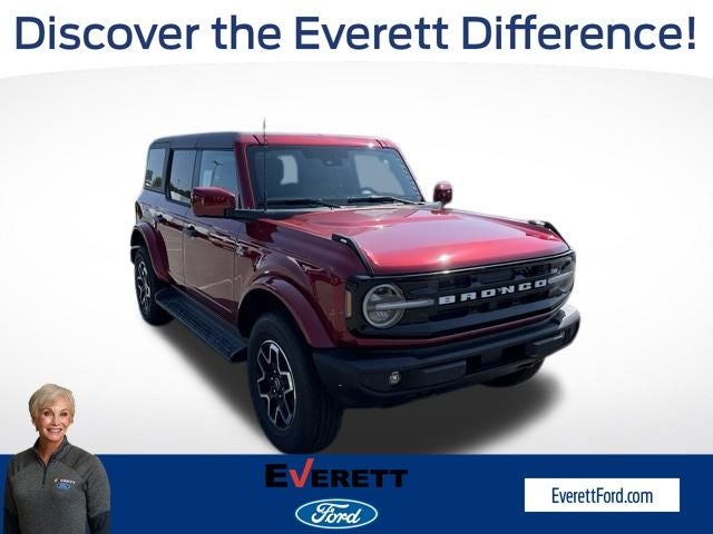 2026 Ford Bronco Outer Banks in Ruby Red Metallic — front three-quarter view
