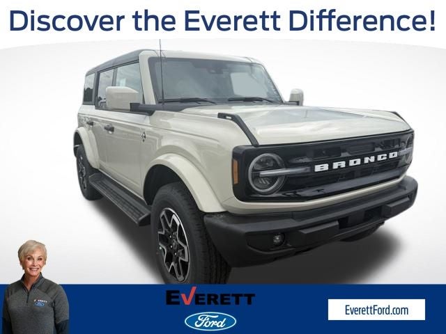 2026 Ford Bronco Outer Banks in Desert Sand — front three-quarter view