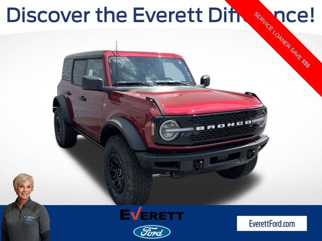 2026 Ford Bronco Badlands in Ruby Red — front three-quarter view