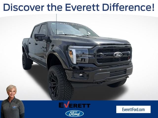 2026 Ford F-150 Lariat in Agate Black Metallic — front three-quarter view