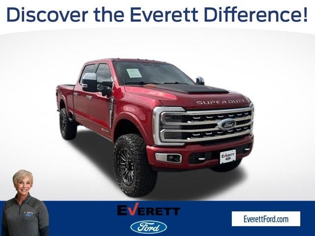 2024 Ford F-250SD Platinum in Red Metallic — front three-quarter view