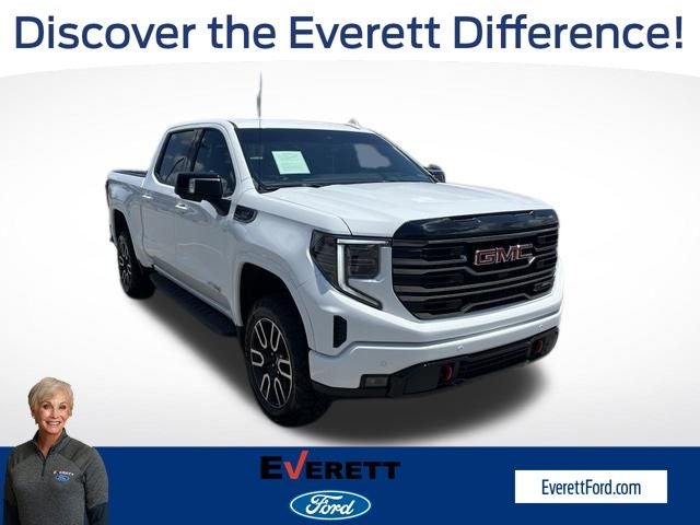 2026 GMC Sierra 1500 AT4 in Summit White — front three-quarter view